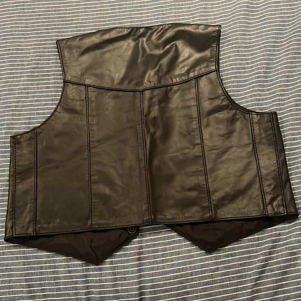 leather vest. Very cute